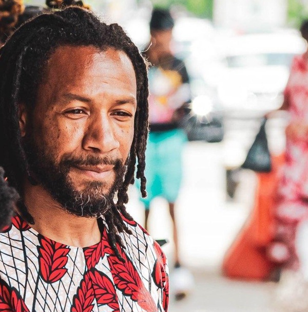 Negus Adeyemi in african shirt